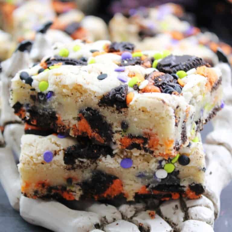 Oreo Cake Bars on a skeletal hand.