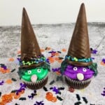 Chocolate cupcakes topped with chocolate-coated ice cream cones.