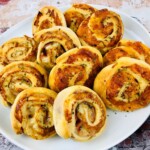 Ham and Cheese Roll-Ups on a white plate.