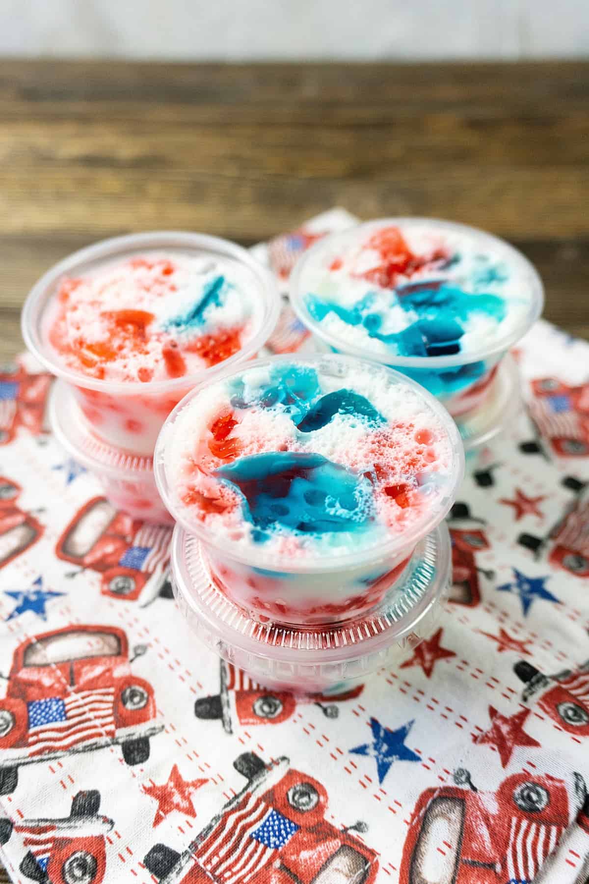 4th of July themed jello shots in a small plastic cup container.