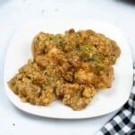 White plate of Chicken Stuffing.