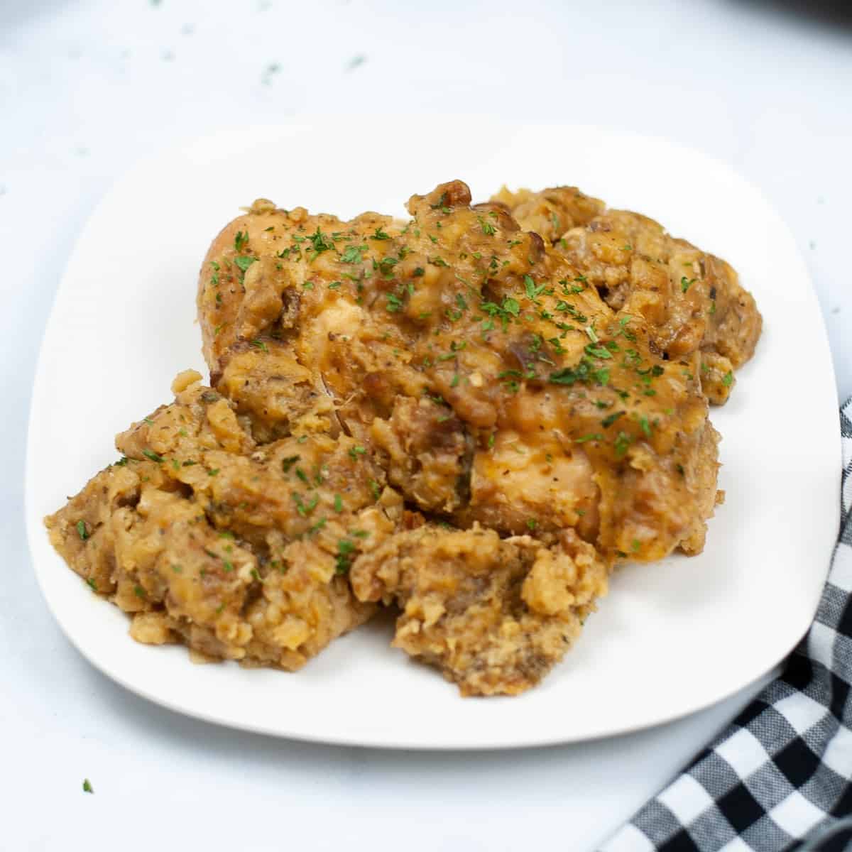 White plate of Chicken Stuffing.