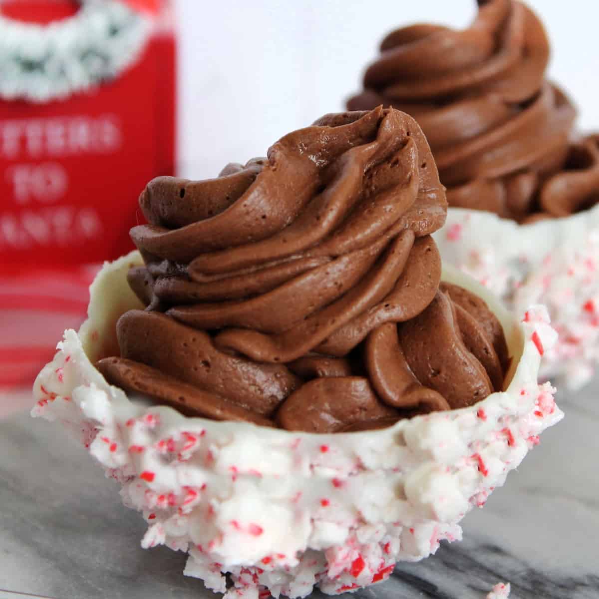 Piles of chocolate mousse in candy bowls.