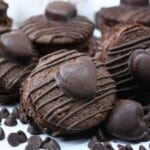 Chocolate Whoopie Pies surrounded by chocolate chips.