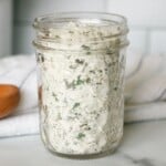 Glass jar of ranch seasoning mix.