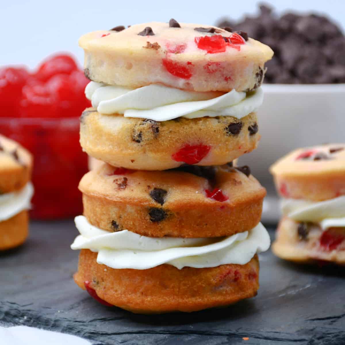 Two stacked Whoopie Pies with Cherries and chocolate chips.