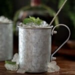 Two Mint Juleps in metal mugs.