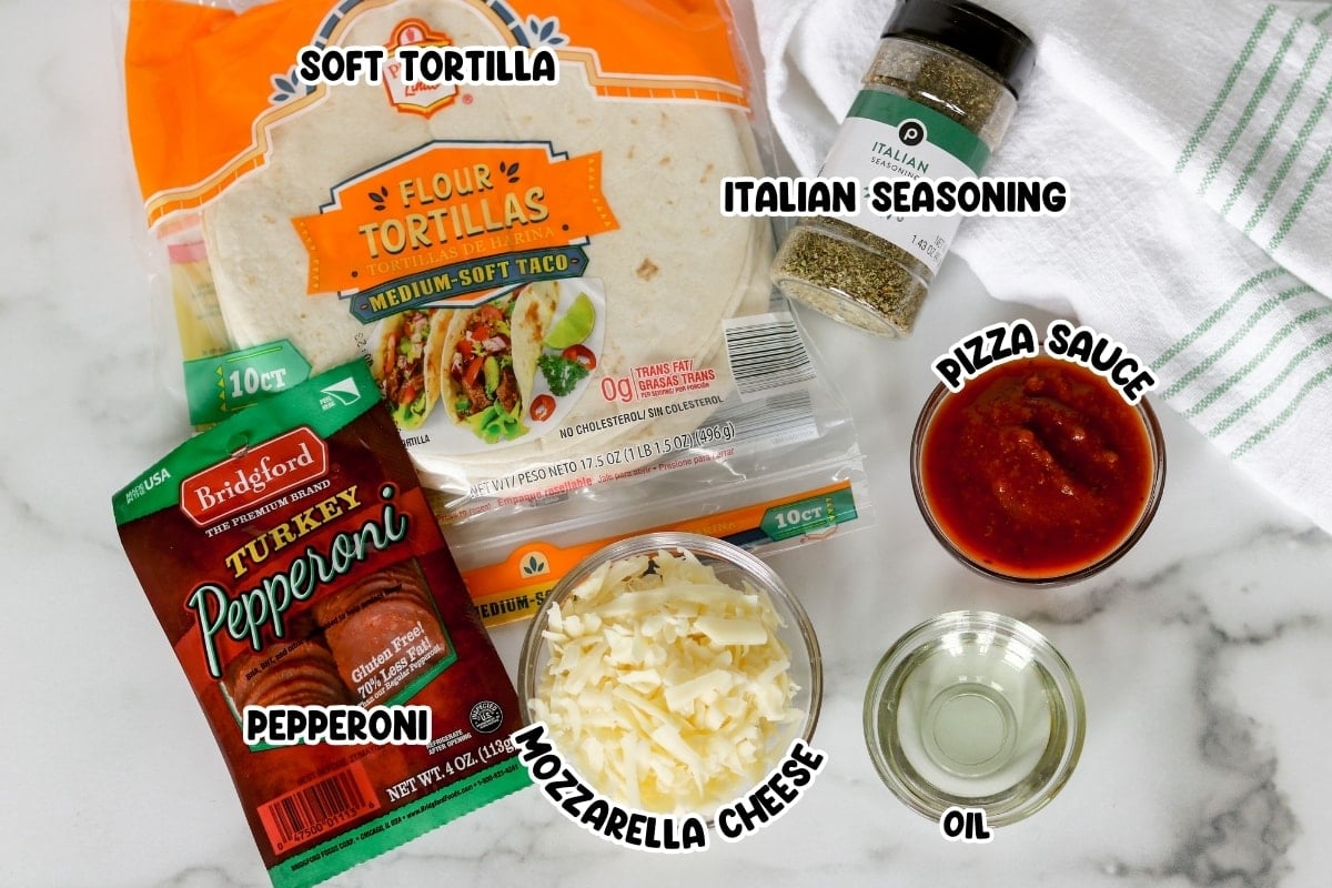 Soft tortilla, mozzarella cheese, Italian seasoning, pepperoni slices, Pizza sauce, and cooking oil on the countertop.