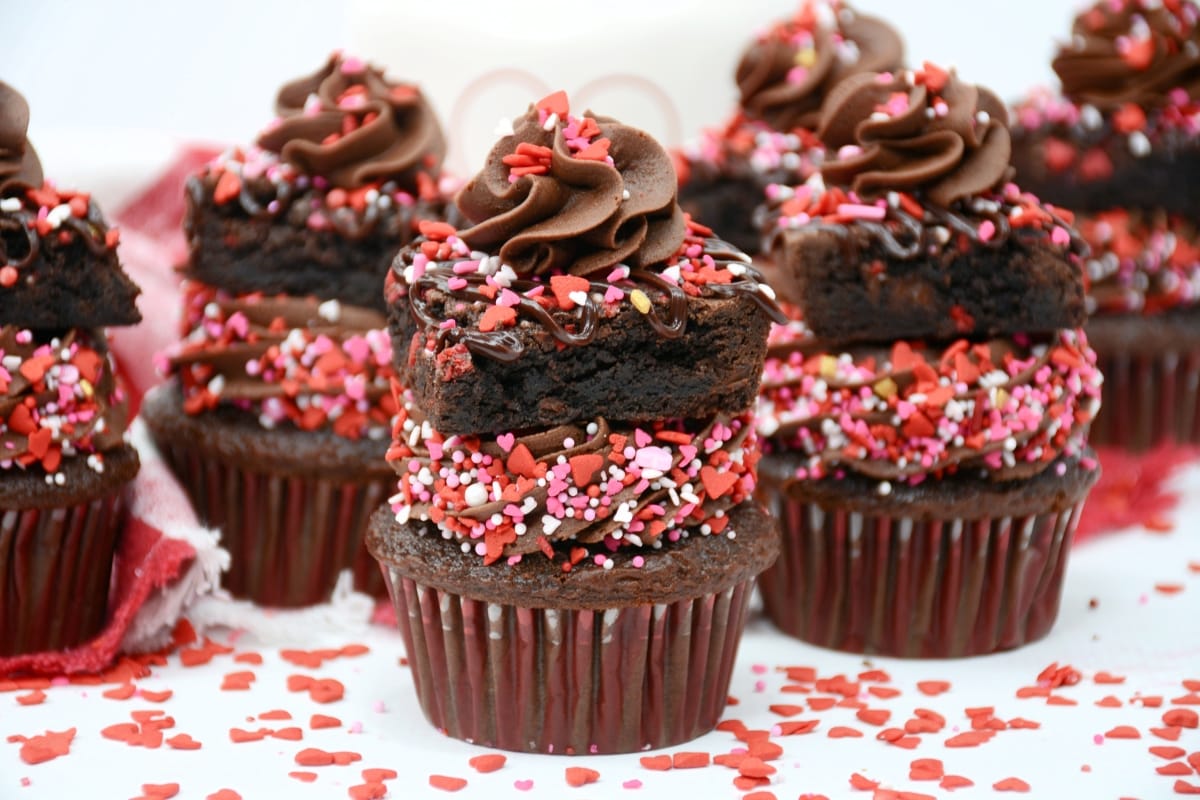 Chocolate Brownie Cupcakes sitting on a white table.
