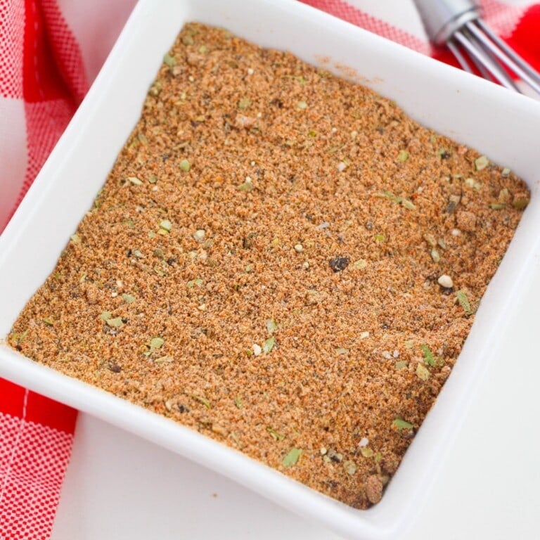 Square bowl of chili seasoning.