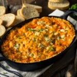 Black pan of Buffalo Chicken Dip.
