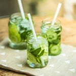 Glass jars of Lemonade with Jalapeno and Cucumber.