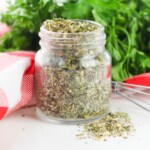 Small glass jar of Mediterranean Herb Seasoning Blend.