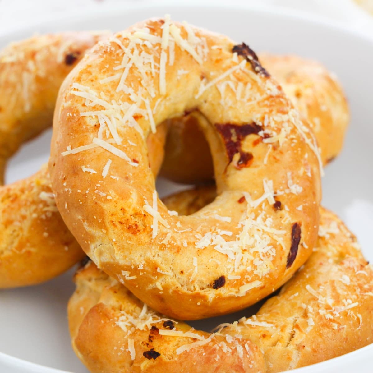 Bagels with sundried tomato and asiago cheese.