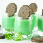 Dirty Girl Scout Shots garnished with mint chocolate cookies.