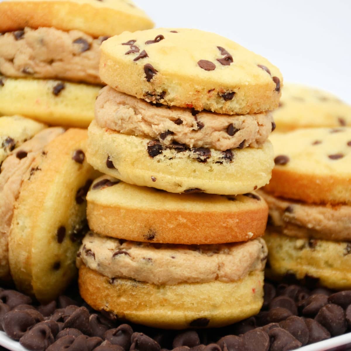 A stacked of whoopie pies with frosting.