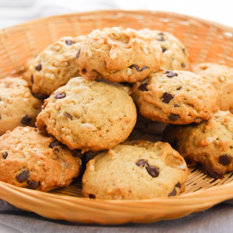 Rice Krispie Cookies with chocolate chips sitting on a plate basket.