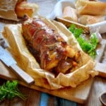 Apple Stuffed Pork Tenderloin on parchment paper.