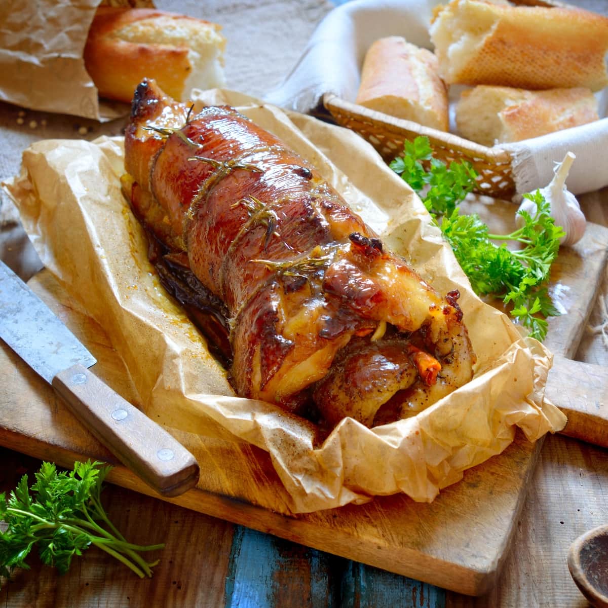 Apple Stuffed Pork Tenderloin on parchment paper.
