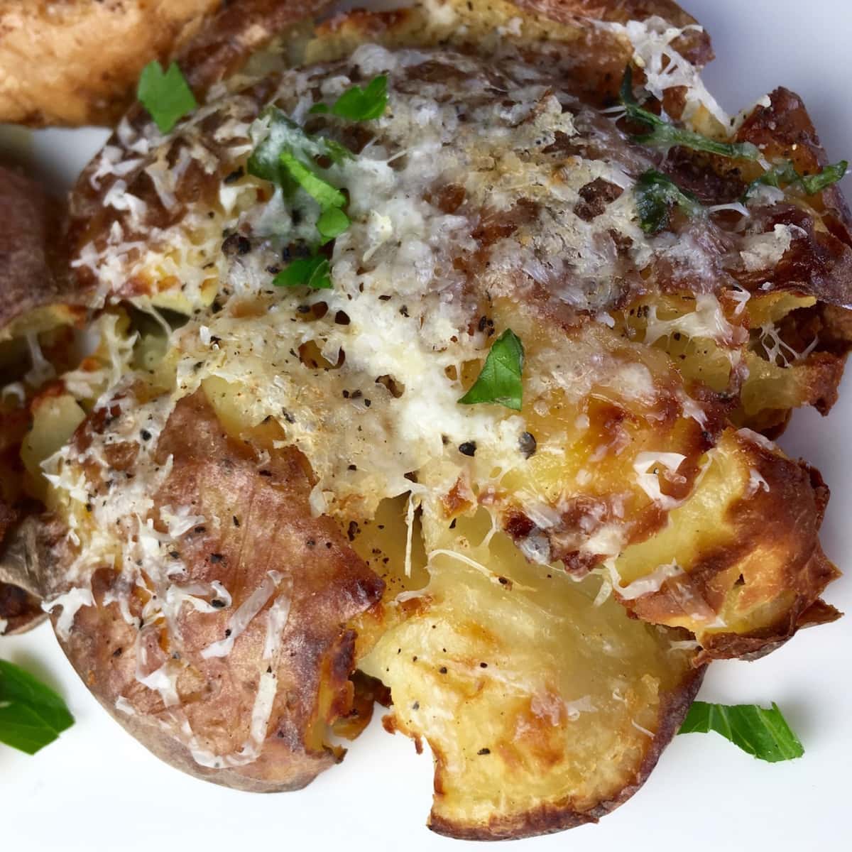 A plate of Cheesy Crash Hot Potatoes.