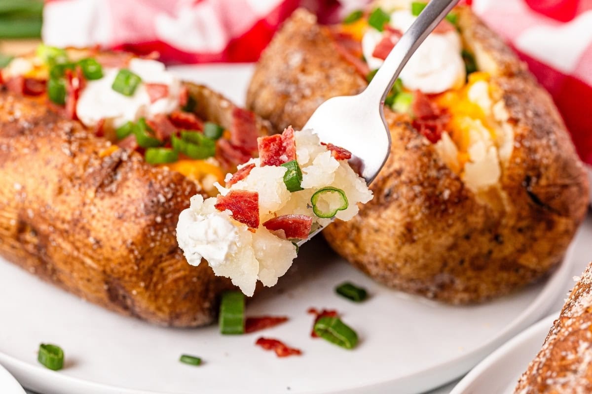 A fork with baked potatoes.