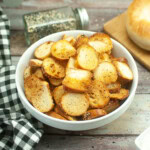 A bowl of bagel chips with everything bagel seasoning.