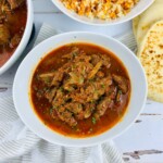White bowl of Indian beef.