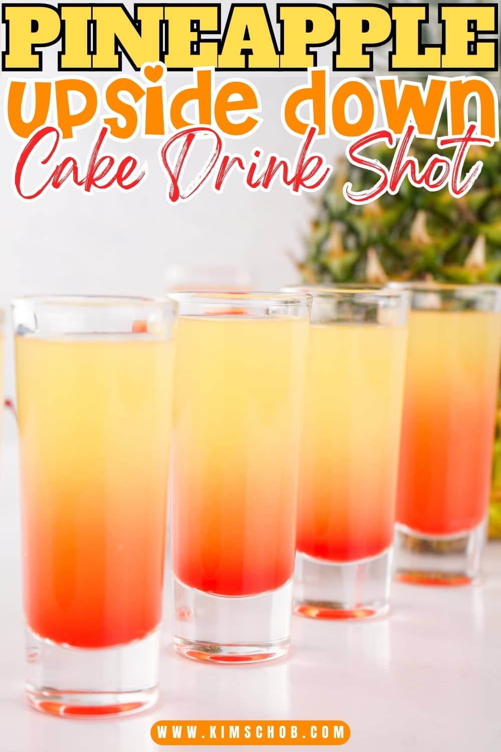 4 lined shot glass with pineapple vodka.