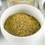 A white bowl of poultry seasoning.