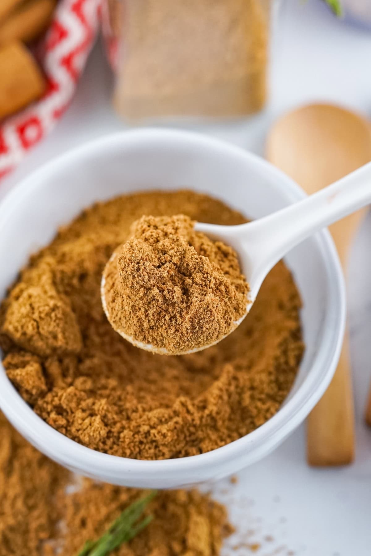 A spoon full of Gingerbread Spice mix.