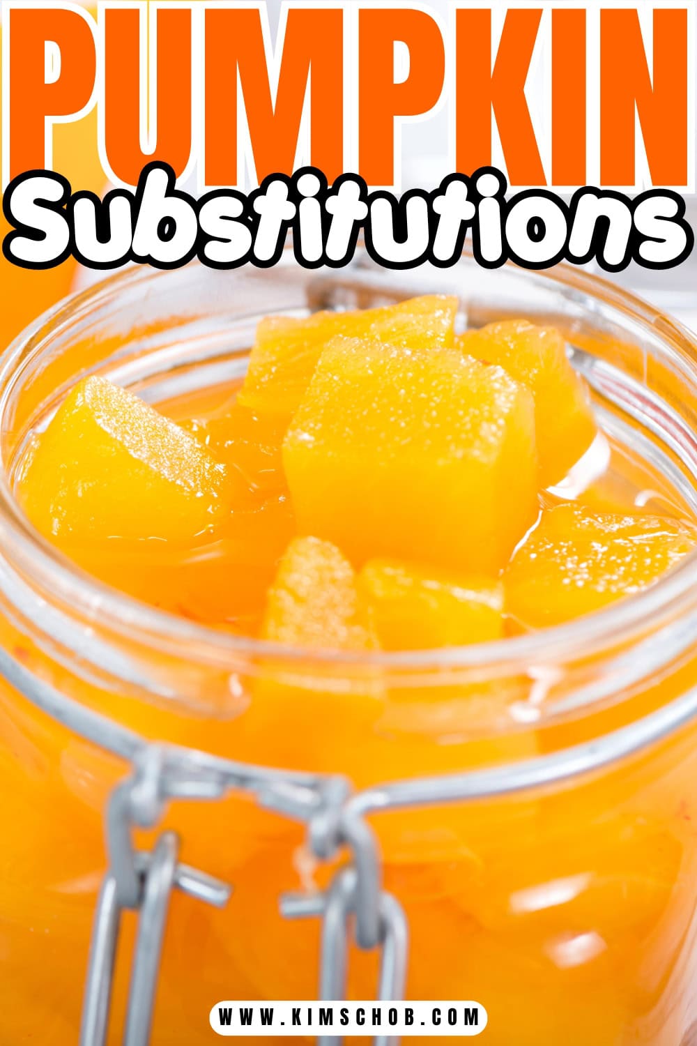 Glass jar filled with diced canned pumpkin pieces.