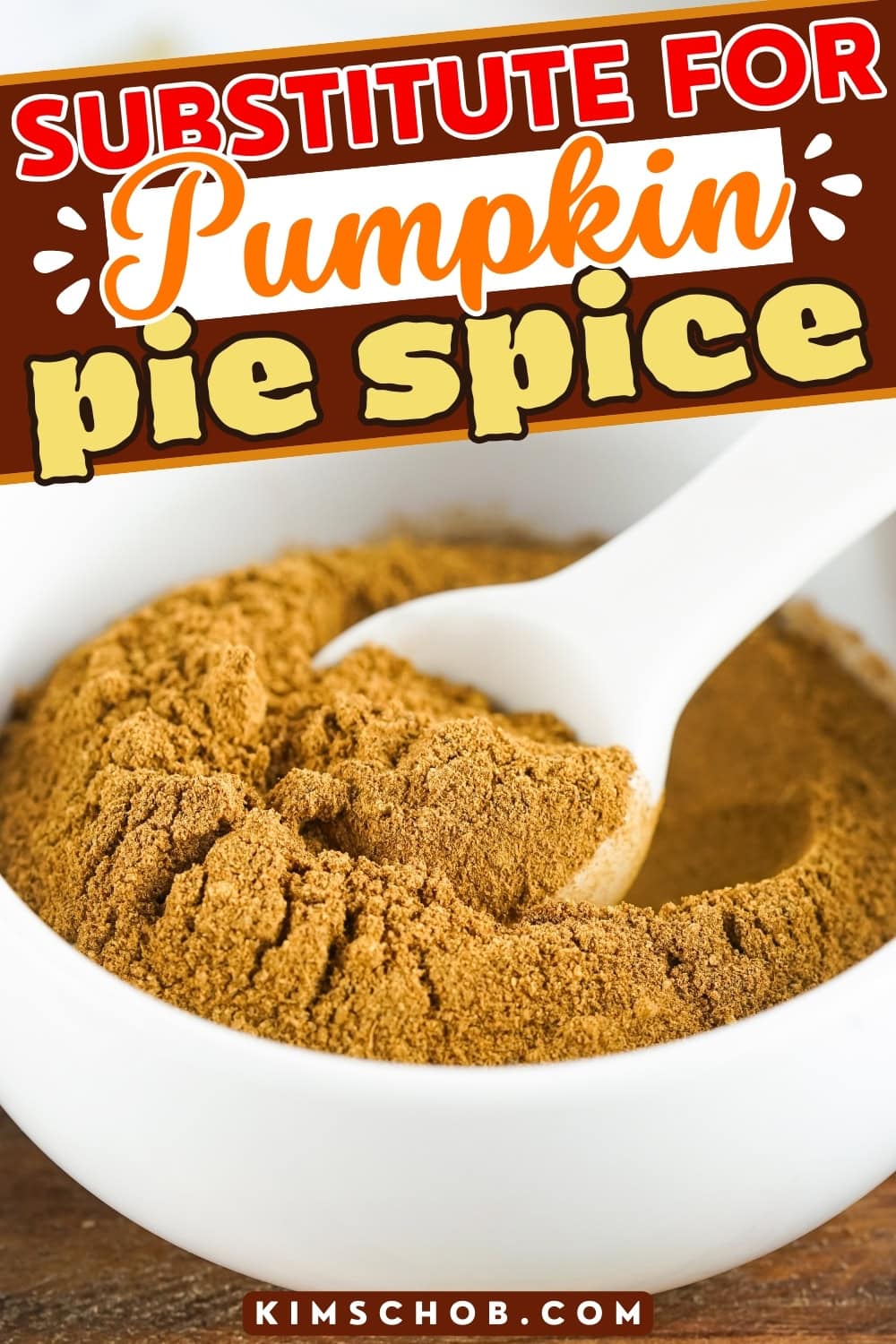 A white bowl filled with pumpkin spice powder and a white spoon.