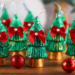 Christmas tree chocolates with red bow.