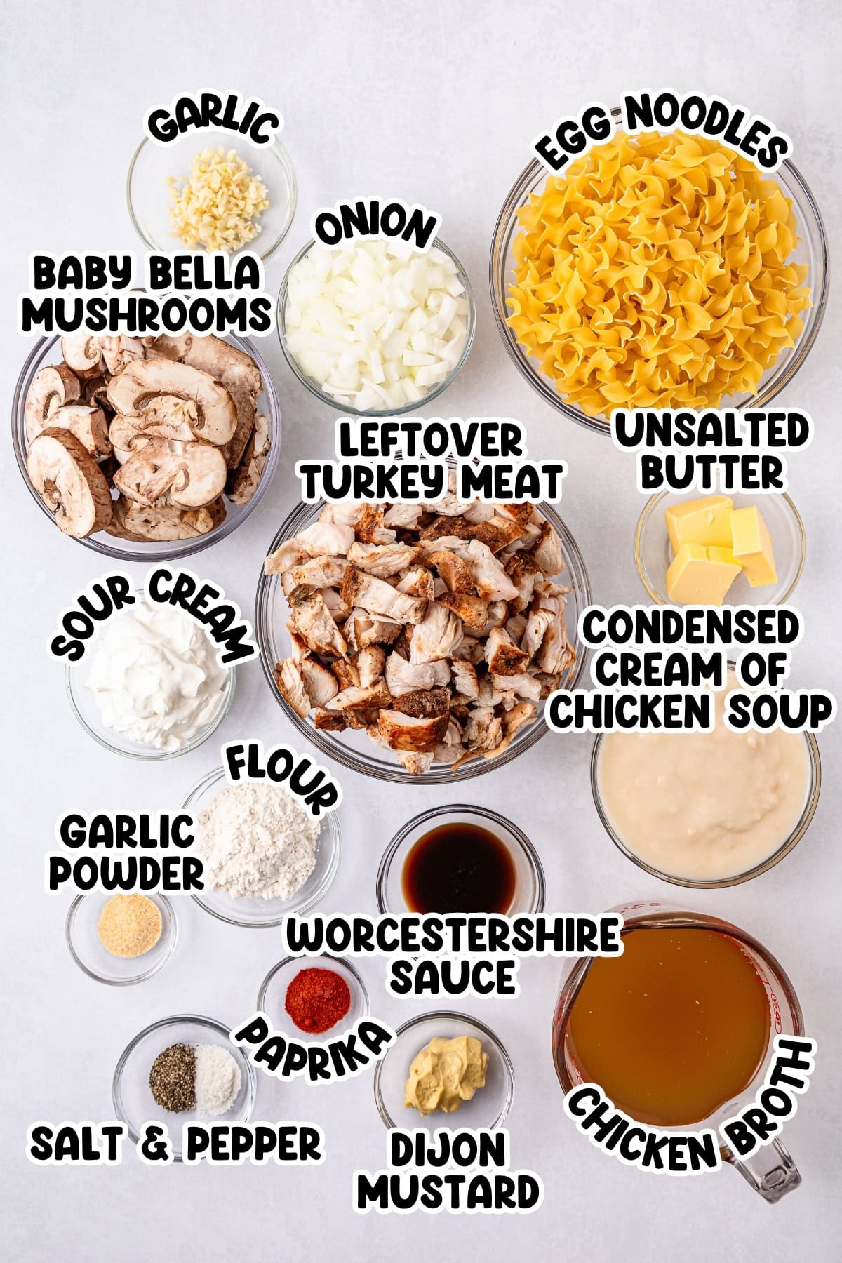 Ingredients for turkey stroganoff in separate bowls.