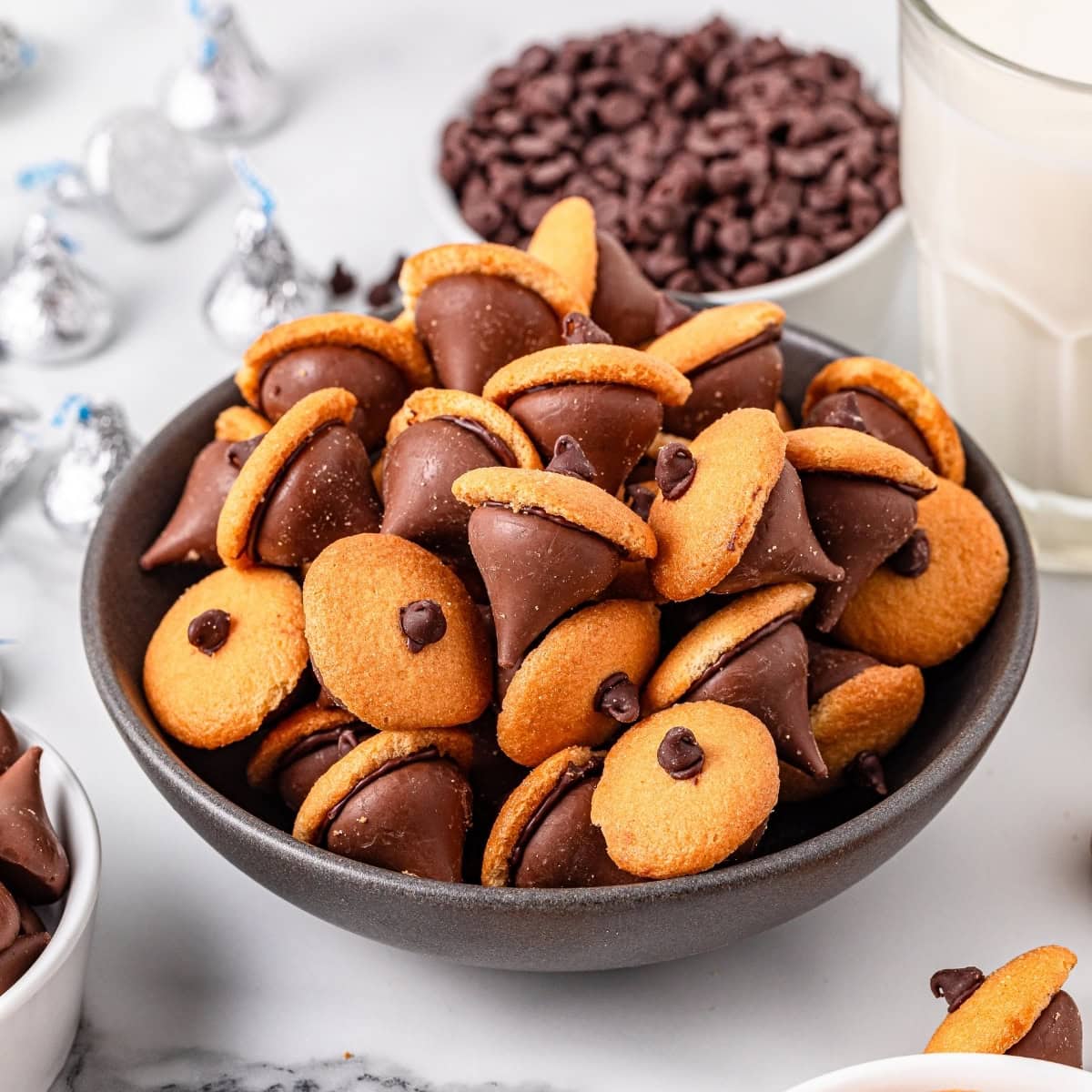 Bowl of acorn themed chocolate and cookie treats.