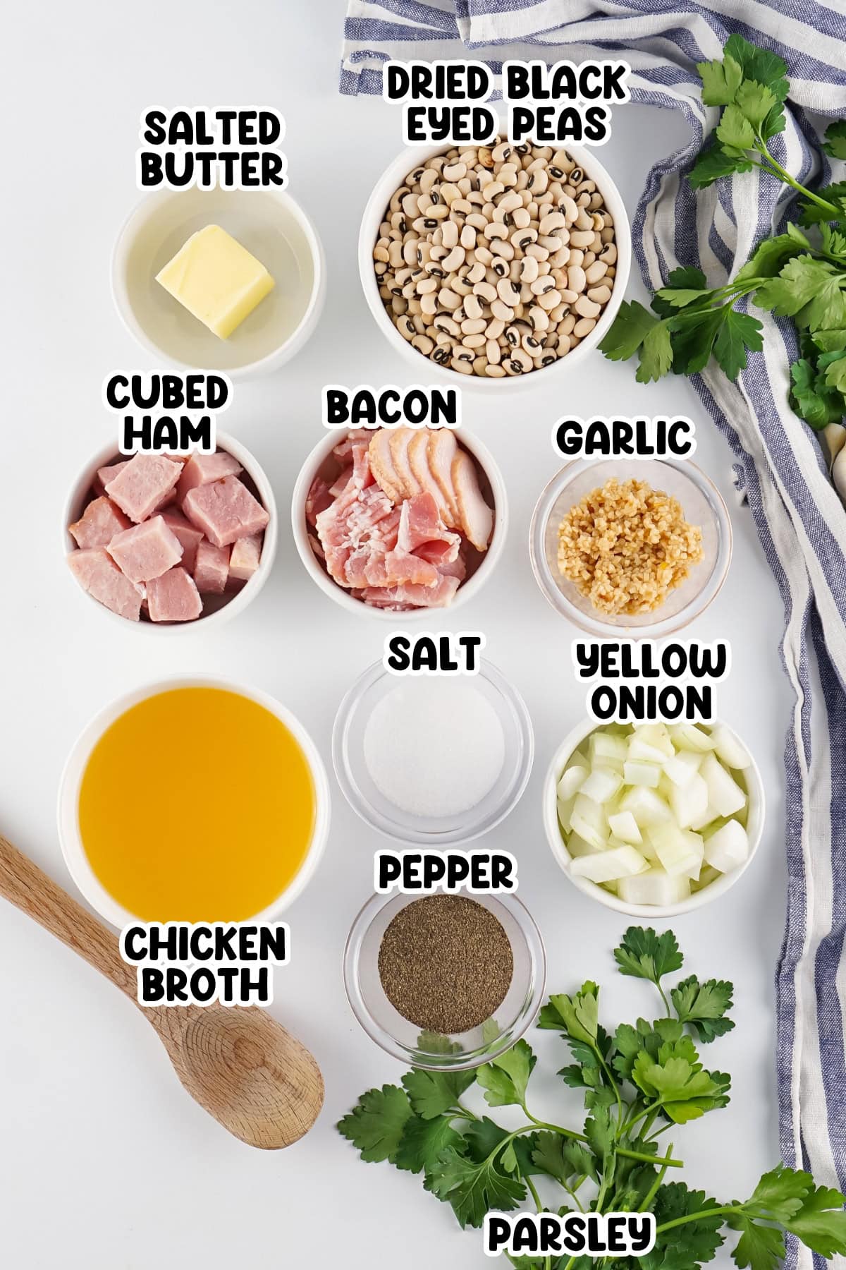 Ingredients for a dish laid out, including peas, ham, bacon, and spices.