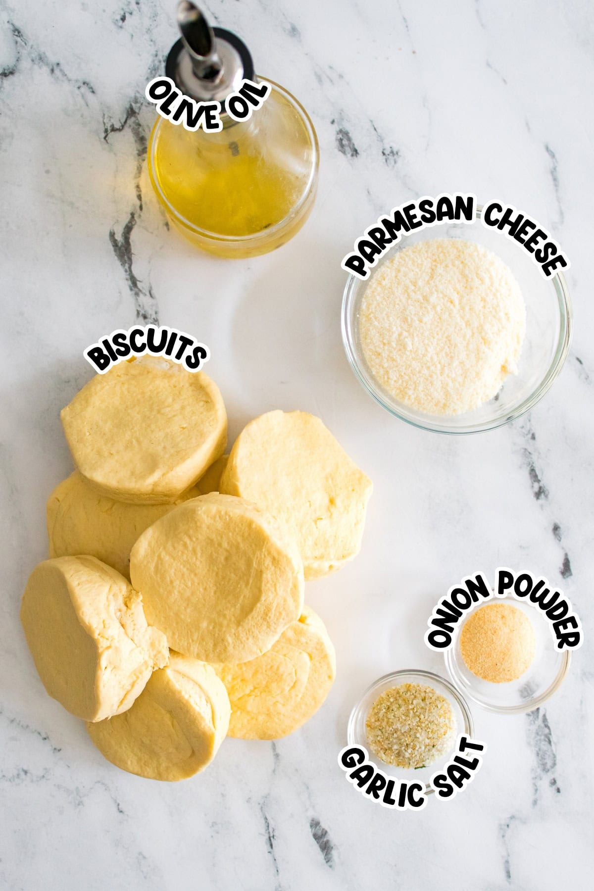 Biscuit dough, olive oil, parmesan cheese, onion powder, and garlic salt.