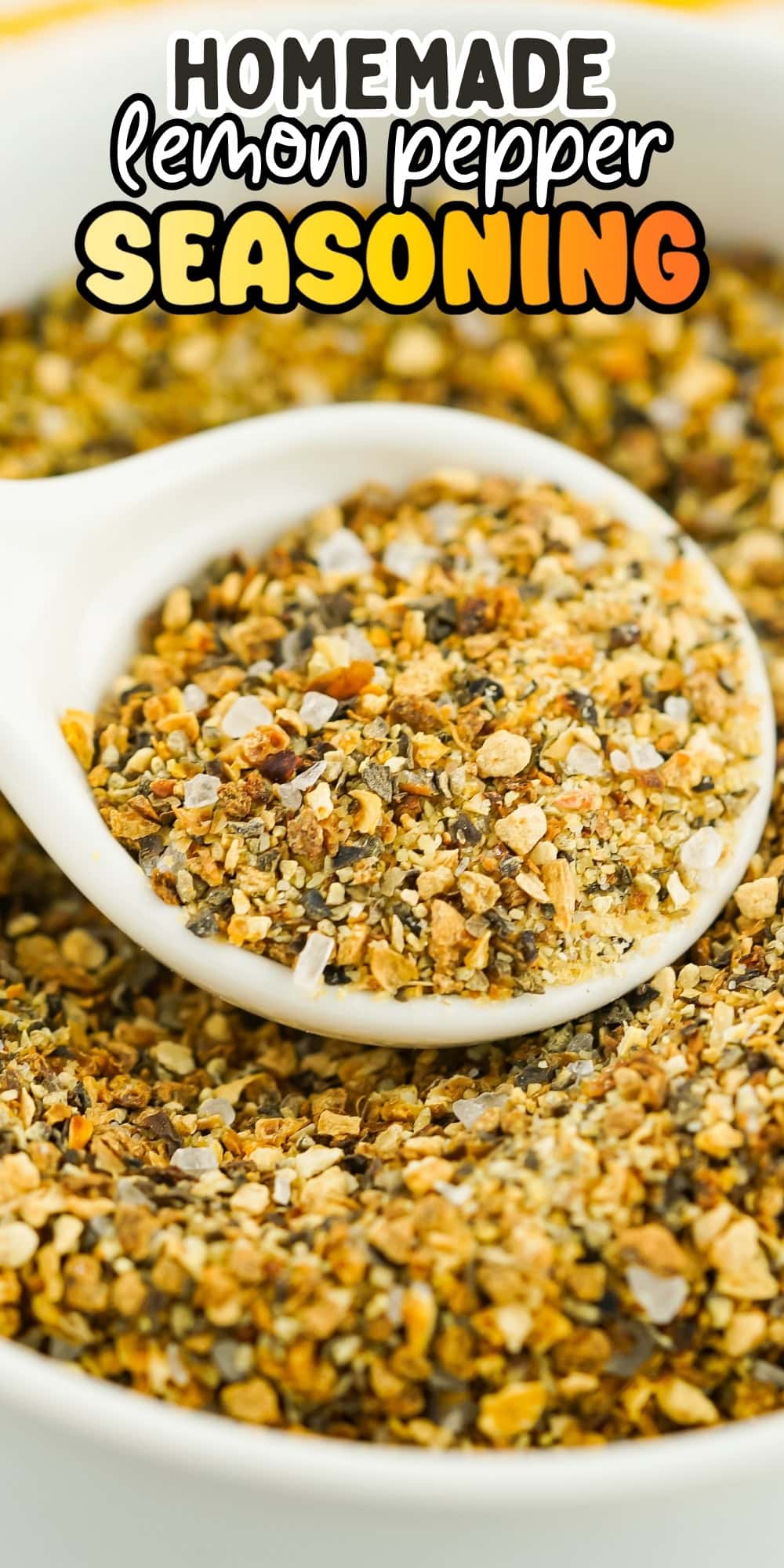Lemon pepper seasoning in a white spoon and bowl.