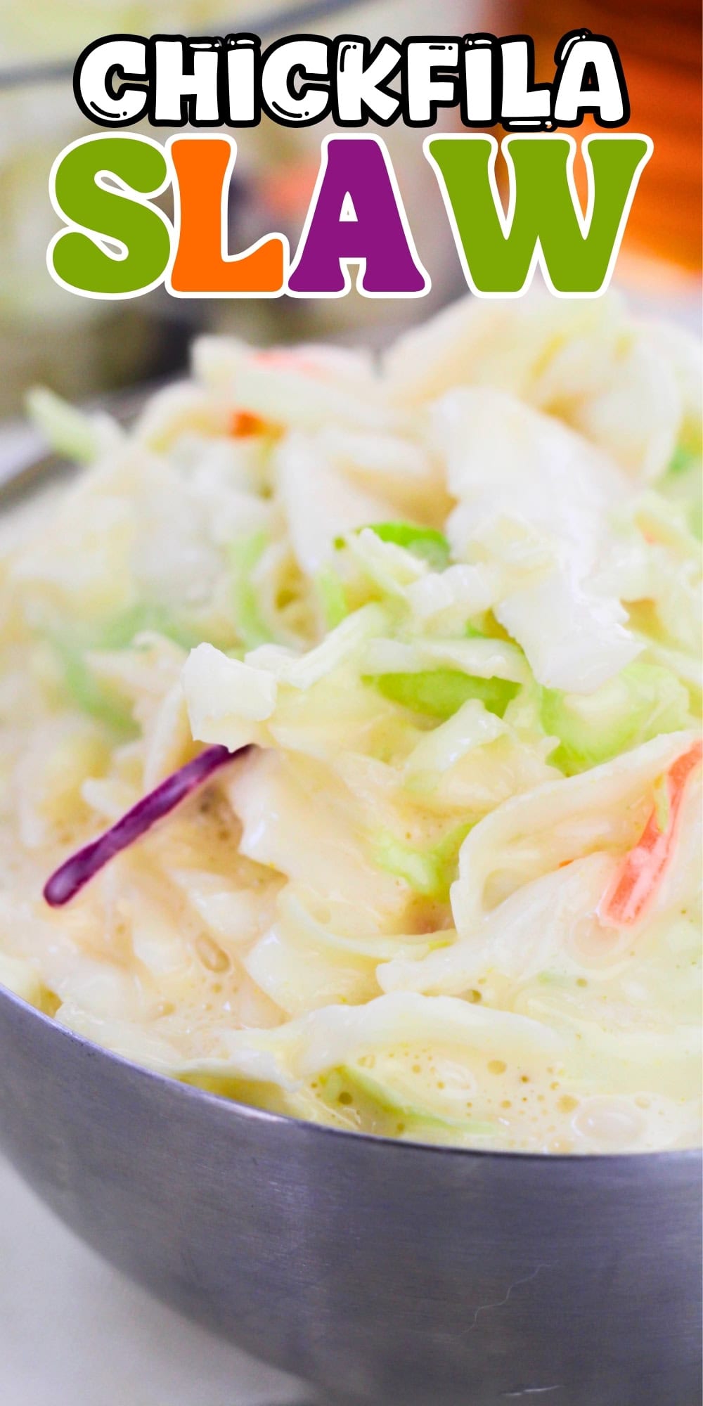 A bowl of creamy coleslaw.