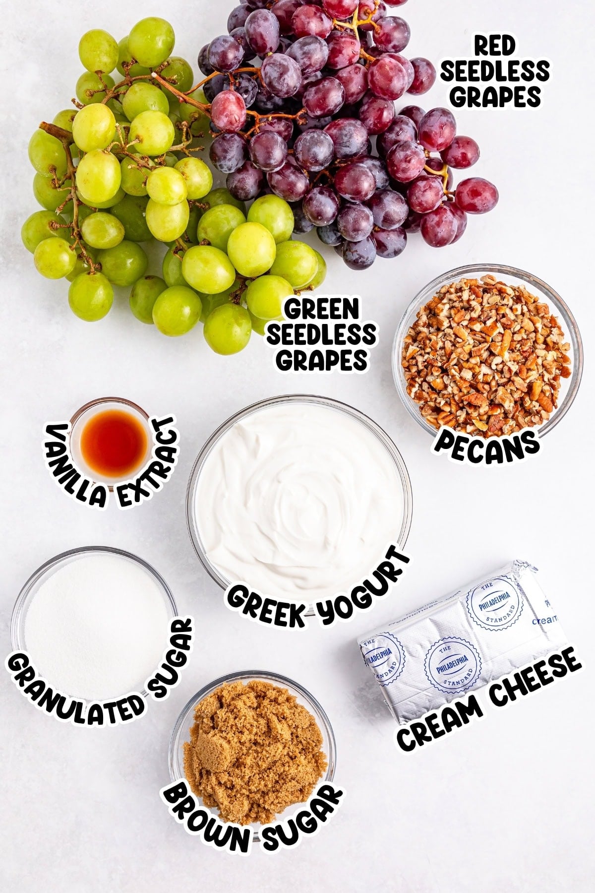 Green and red grapes, pecans, Greek yogurt, cream cheese, sugars, vanilla.