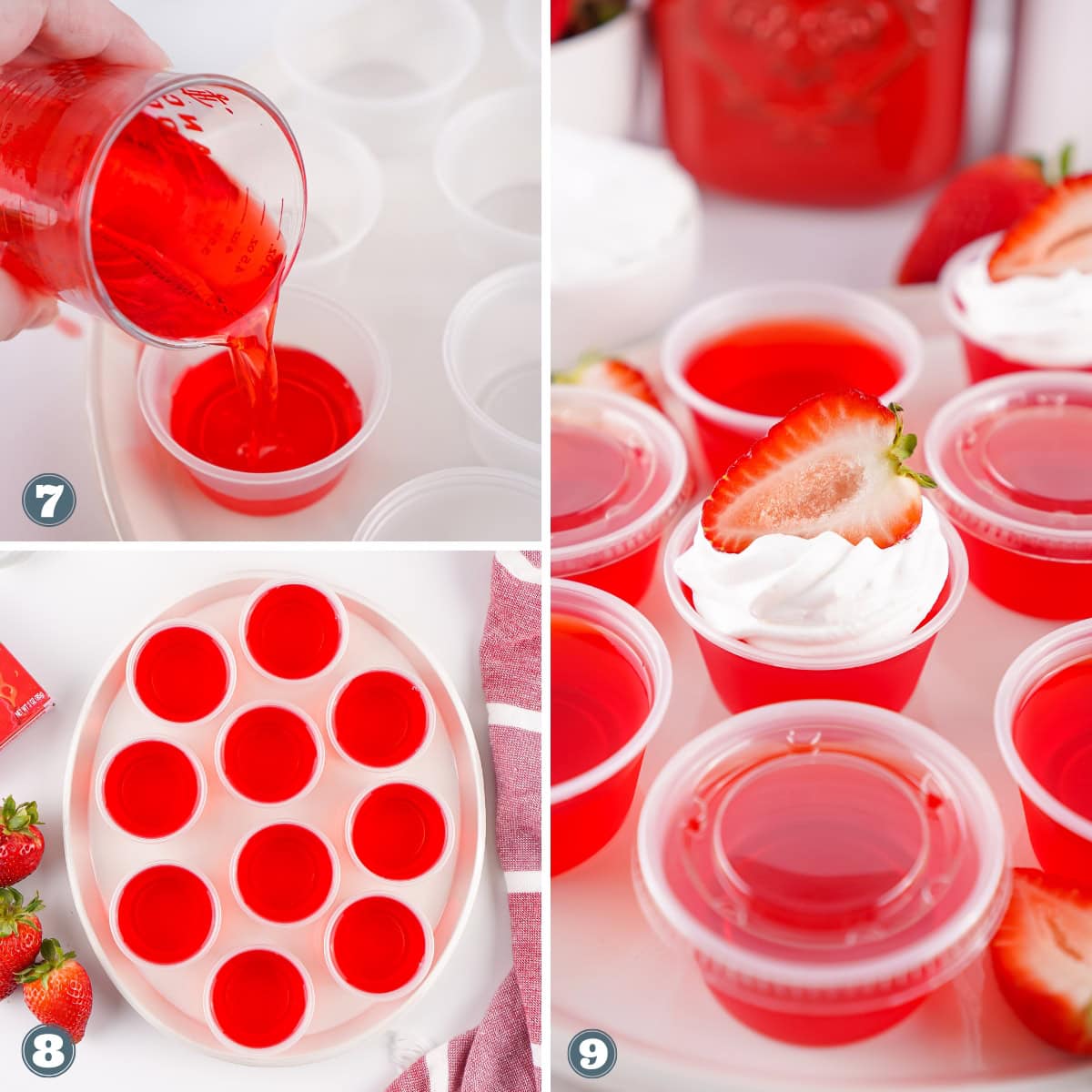 Red jello shots in small cups, some topped with whipped cream and strawberry.