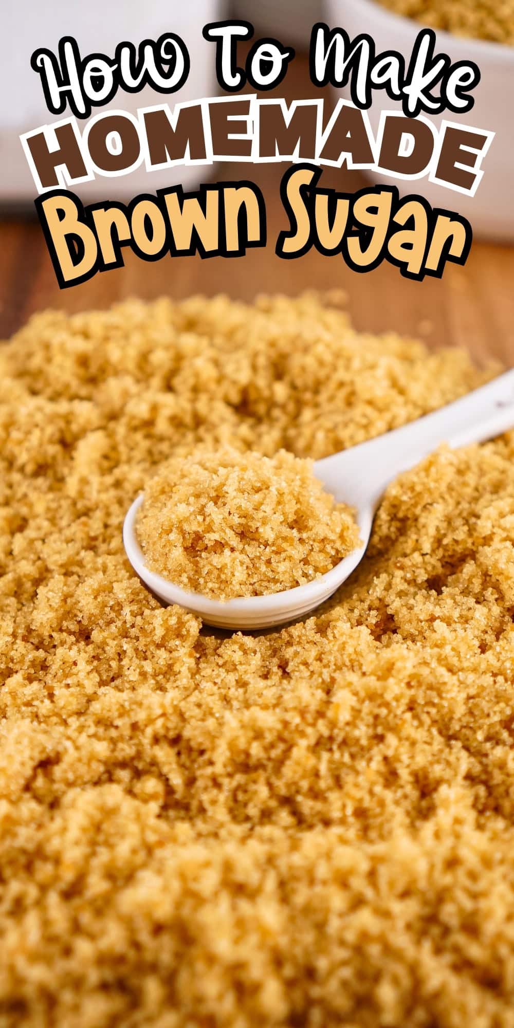 A spoon scooping homemade brown sugar.