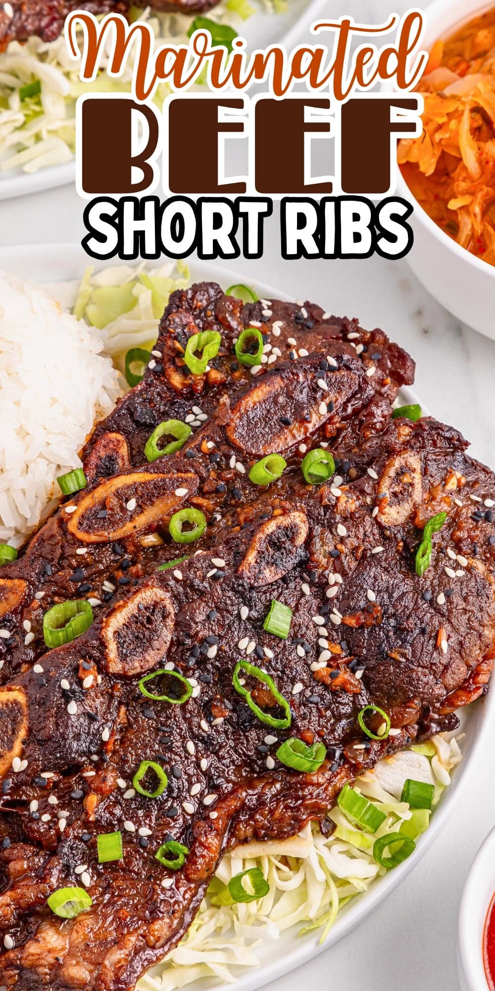 Grilled marinated beef short ribs topped with green onions and sesame seeds.