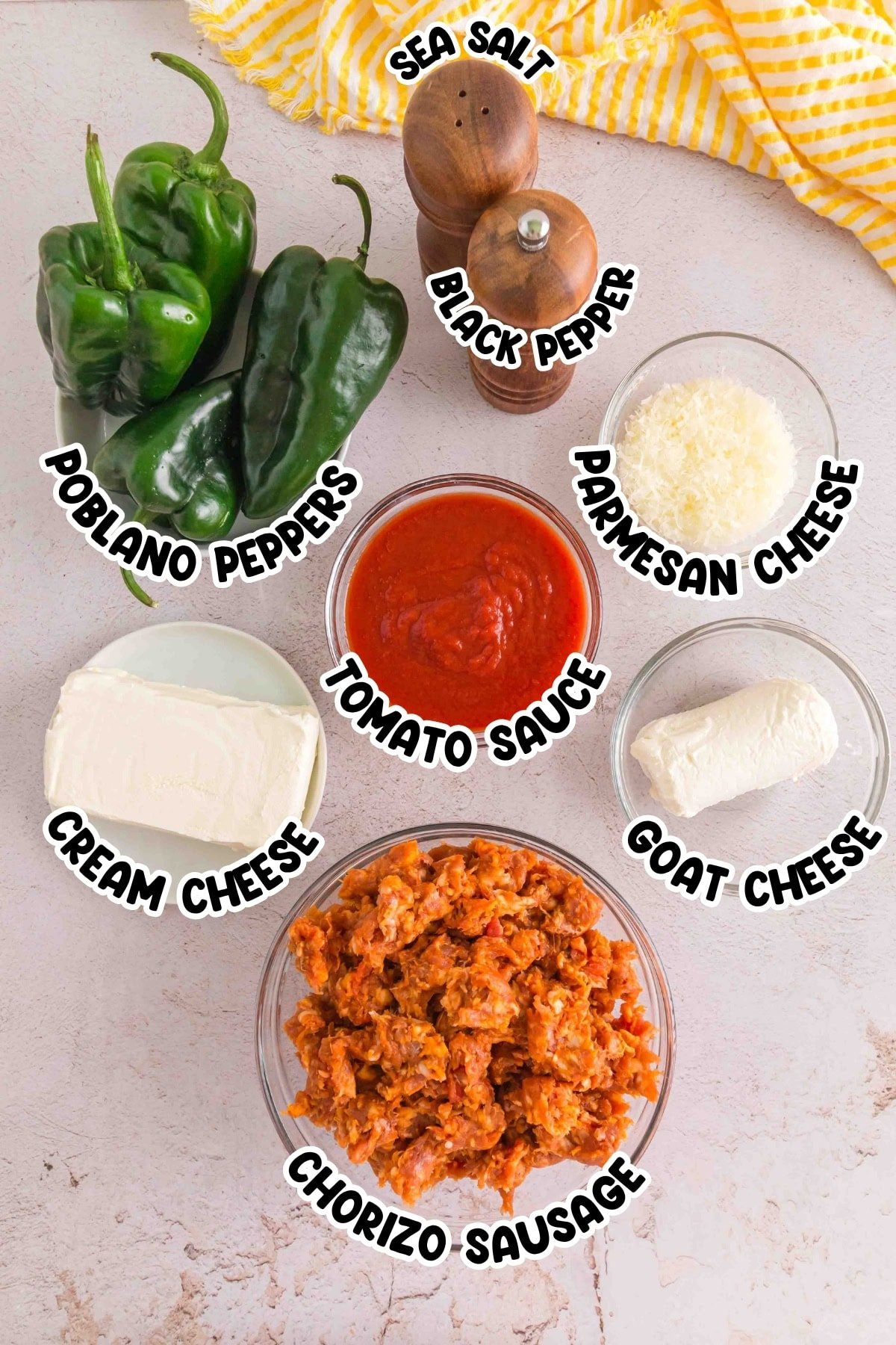 Labeled ingredients for a recipe: peppers, cheeses, tomato sauce, sausage, spices.