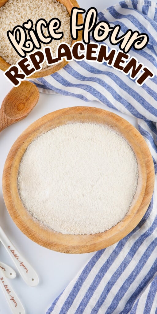 Wooden bowl of rice flour on a striped towel.