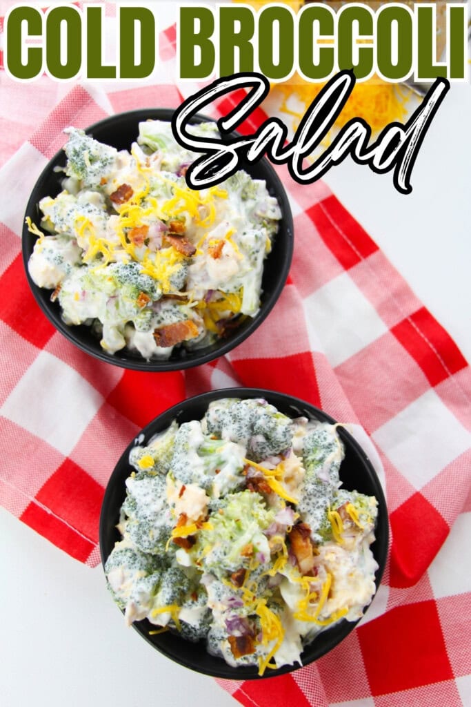 Two bowls of cold broccoli salad on a red and white checkered cloth.