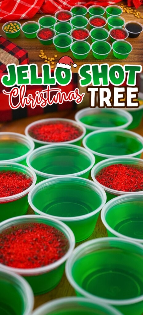 Green jello shots in cups arranged in a Christmas tree shape with red sprinkles.