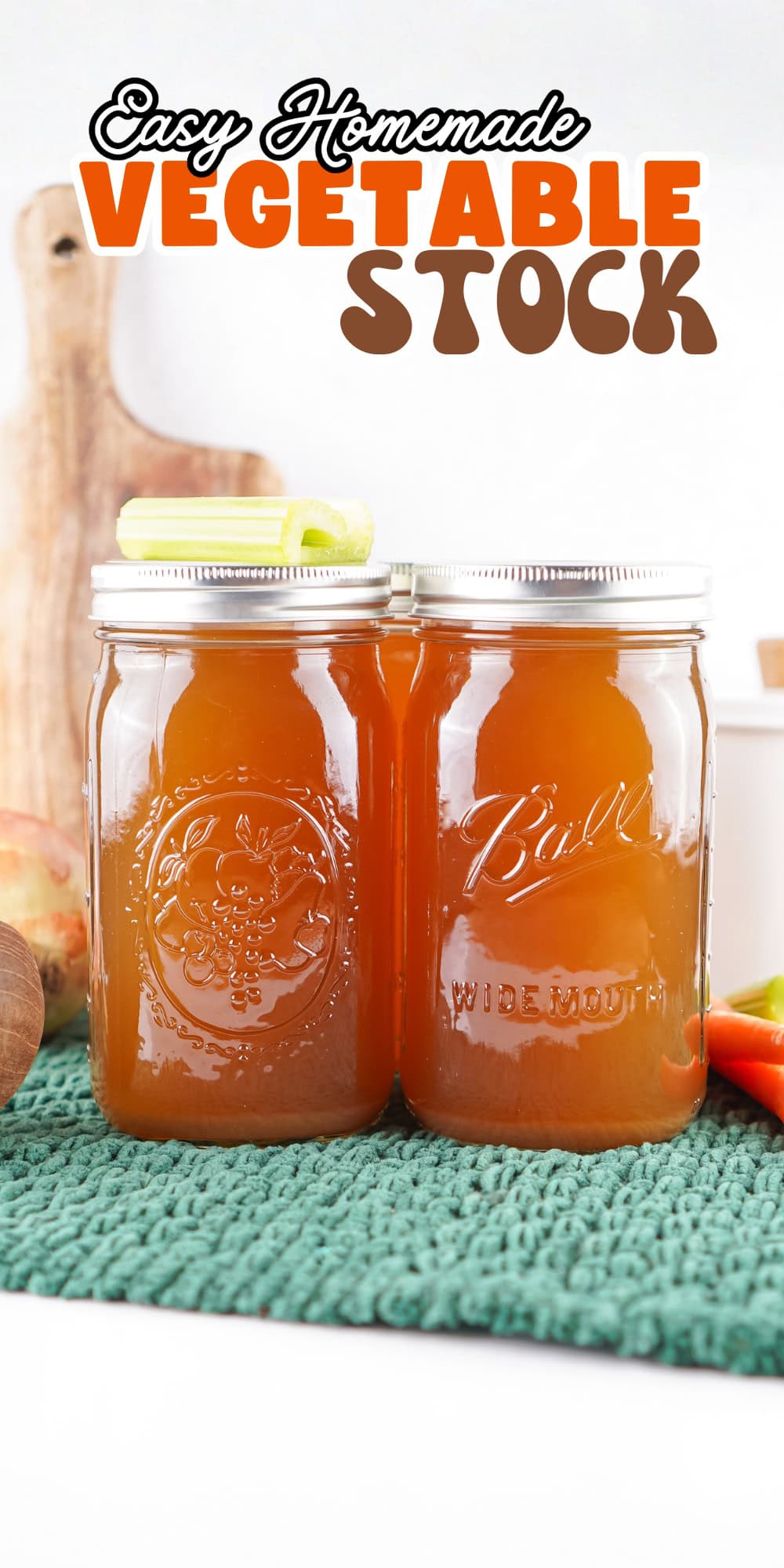 Two jars of homemade vegetable stock.