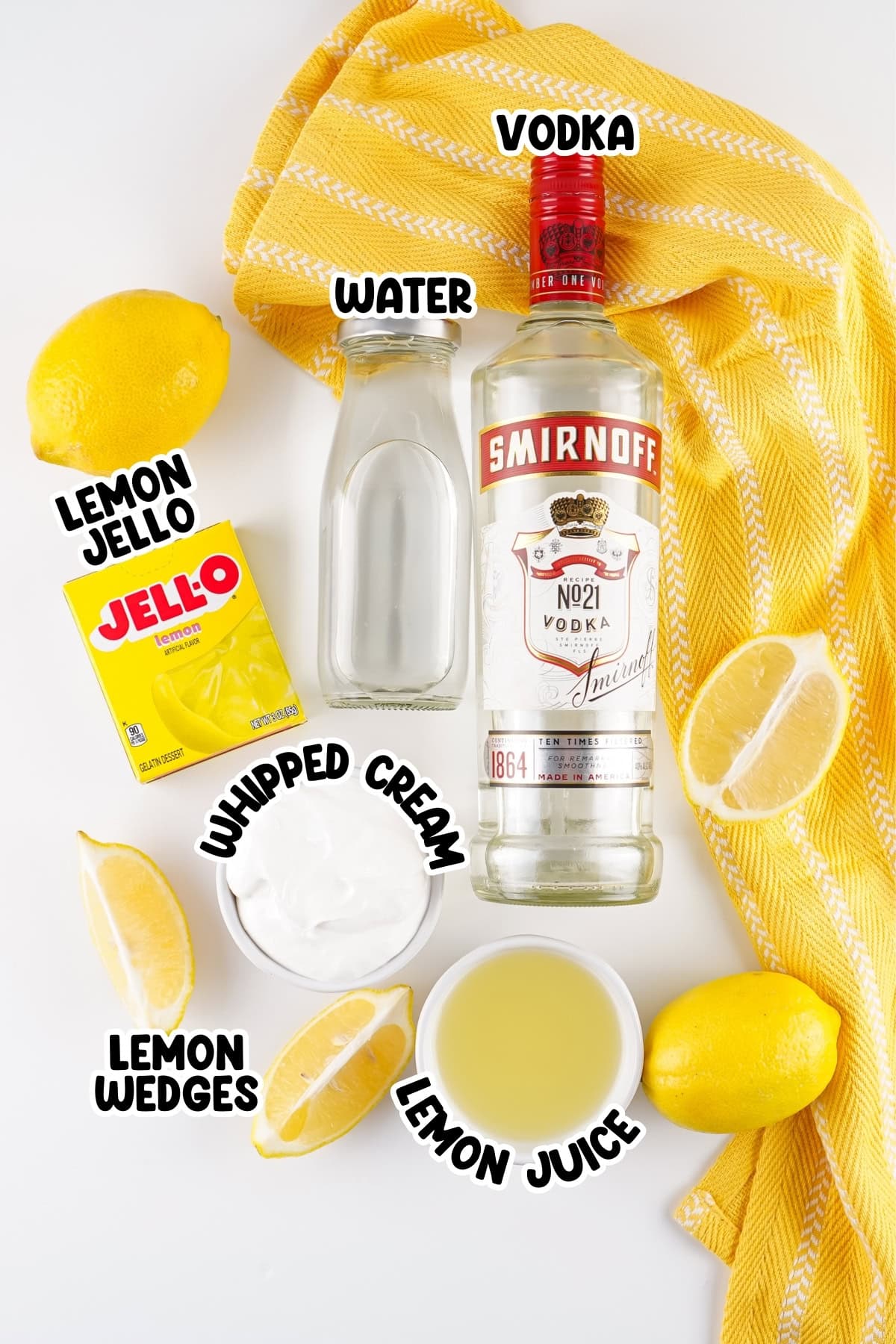 Ingredients for a lemon cocktail: vodka, water, jello, whipped cream, lemons.