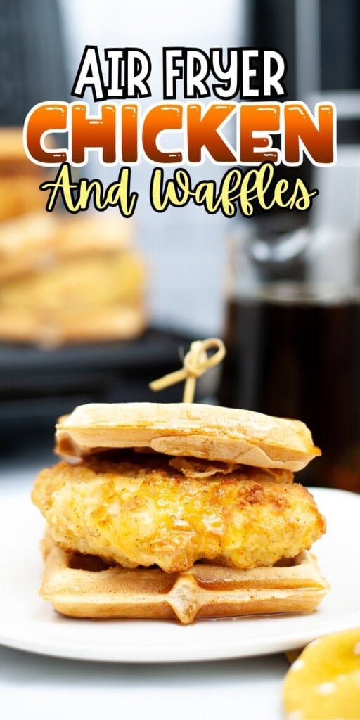 A chicken and waffle sandwich on a white plate.